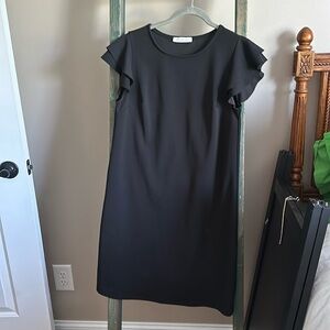 Black dress with ruffle cap sleeve